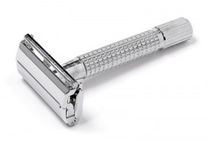 Safety razor, holds one disposable shaving blade